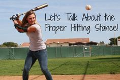 a woman swinging a baseball bat at a ball with the caption let's talk about the proper hitting stance