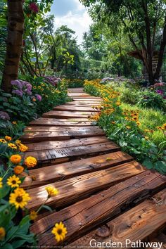 a wooden walkway surrounded by flowers and trees