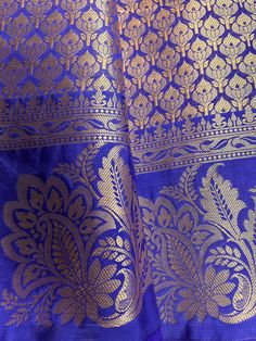 Gorgeous Statement designer Saree in Royal Blue color with Muted Gold Zari Weaving. Saree has Floral Motifs all over with design pattern borders with big flower buttas. Item : SareeColor : Royal Blue Base Fabric : Banarasi Silk Blouse material : Soft Banarasi Silk Work : Handloom Royal Blue Saree, Kids Ethnic Wear, Brocade Blouse, Brocade Blouses, Jacquard Design, Blue Saree, Banarasi Silk Saree, Blouse Material, Royal Blue Color