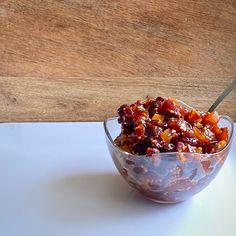 a bowl filled with food sitting on top of a white plate