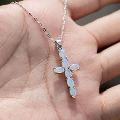 Natural Australian Solid Opal Cross Pendant Necklace 925 Solid Sterling Silver. Free Domestic USPS First Class Shipping! Free One Year Limited Warranty! Free Gift Bag or Box with every order! Opal—the queen of gemstones, is one of the most beautiful and rarest gemstones on earth. Every piece of opals has its colors and patterns, which is perfect for designers to create unique engagement rings for someone extra special. We use 100% Natural & Ethically opal stones (NO synthetics or imitations) for Large Opal Necklace, One-of-a-kind Silver Opal Jewelry, Adjustable Nickel-free Opal Jewelry, Artisan Silver Opal Necklace, Nickel-free Opal Pendant Jewelry, Opal Birthstone, Australian Black Opal, Rare Gemstones, Cross Pendant Necklace