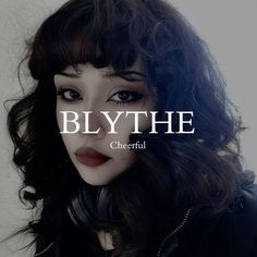 a woman wearing headphones with the words blythe on it