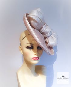 Beige / sand small saucer fascinator /  hat / hatinator with an ivory contemporary silk bow This style suits everyone its a pervect size!  Blocked wired and finished by hand. Can be made in any colour Elegant Beige Curved Brim Fascinator, Elegant Bow Hat For Kentucky Derby, Elegant Cream Hat With Bow, Elegant Kentucky Derby Hat With Bow, Fitted Hat With Bow And Curved Brim, Chic Cream Fascinator With Short Brim, Elegant Hat With Bow And Curved Brim, Formal Cream Headpiece With Short Brim, Elegant Hat With Bow For Royal Ascot