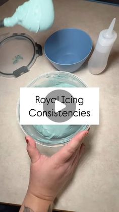 a person is holding a bowl with food in it and the words royal icing constienscies