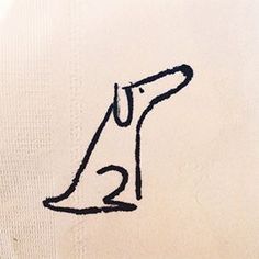 a close up of a napkin with a drawing on it