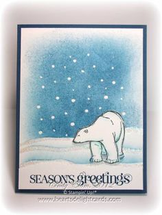 a polar bear card with the words seasons's greetings written in white ink