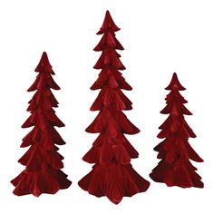 three red plastic christmas trees on a white background