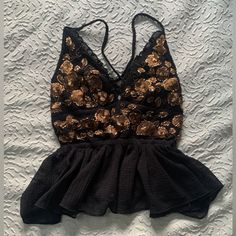 Nwt Never Worn! Strappy Back Perfect For Going Out Lightweight And Comfy Make An Offer! If It Hasn’t Sold By 8/1 I’m Donating It :) Black Peplum Top With Ruffles, Chic Embroidered Tops For Night Out, Fitted Peplum Top For Date Night, Black Fitted Peplum Top For Party, Fitted Black Peplum Top For Night Out, Fitted Black Peplum Top For Party, Sleeveless Floral Embroidered Party Top, Black Peplum Top For Party, Black Top With Floral Embroidery For Night Out