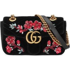 Description The mini GG Marmont chain shoulder bag has a softly structured shape and an oversized flap closure with Double G hardware. This pink velvet GG Marmont embroidered bag from Gucci is exquisitely feminine. This striking piece has been fashioned from black silk-velvet adorned with the label’s signature embroidered multi-colored blooms. The sliding chain strap can be multiple ways, changing between a shoulder and a top handle bag. Made in embroidered chevron velvet with a heart on the bac Chevron Purse, Oversized Purse, Sequin Handbag, Man Shoulder, Handbags Gucci, Cl Fashion, Structured Handbags, Sequin Purse, Flower Handbag