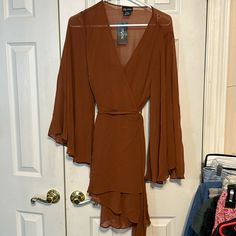 Nwt Citichic Dress Rust With Tie At Waist, Flowing Sleeves Cami Underneath Size 12 Or Xxs V-neck Chiffon Dress For Fall Party, Fitted Long Sleeve Chiffon Dress For Brunch, Flowy Chiffon Mini Dress With Long Sleeves, Sheer Chiffon V-neck Mini Dress, Sheer Flowy Mini Dress With V-neck, Fitted Long Sleeve Chiffon Dress For Casual Wear, Knee-length Chiffon Mini Dress For Brunch, Chiffon Knee-length Mini Dress For Date Night, Knee-length Chiffon Mini Dress For Date Night