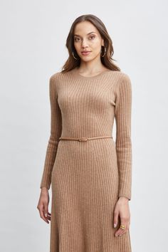 Immerse yourself in the essence of refined luxury with our soft touch Rib Cashmere Knit Dress. This long sleeve midi dress features an easy A-line silhouette & self-belt that is adorned with a gold buckle. Ultra-Soft & understated, this dress defines quiet luxury and can be worn with pumps or the seasons knee grazing boots. Long Sleeve Cashmere Midi Dress with Self Belt & gold buckle 100% Cashmere Runs true to size Model is 5'9" and wearing size S Dry Clean Only Imported Style #: ETR44242 Belt Gold Buckle, Boots Long, Cashmere Sweater Dress, Belt Gold, Long Sleeve Short Dress, Quiet Luxury, Sleeve Midi Dress, Long Sleeve Midi, Long Sleeve Midi Dress