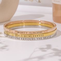 ♥ Custom Bracelet in 18k Gold, Silver or 18k Rose Gold Plating ♥ Personalised Roman Numerals Bangle ♥ Couple or Mom Bangle ♥ Handmade Handwriting Bracelet ♥ Children's Names Bangle ♥ 30th, 40th, 50th, 60th Birthday Jewellery ♥ Mum Gift Postpartum ♥ Christmas Jewellery Introducing our newest bangle style! Modern, stylish and innovative, these bangles feature engraved lettering around the circumference. Wear one alone, stack a trio of colours together or mix them up with our enamel bangle style to Top Selling Jewelry, Engraved Bangle, Handwriting Bracelet, Christmas Jewellery, Enamel Bangle, Custom Bracelet, Bangles Style, Gold Bracelet For Women, Handmade Bangles