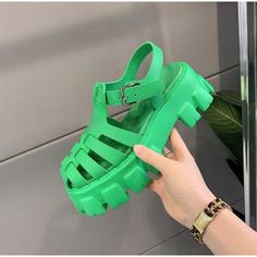 Shipping: Worldwide Express Shipping AvailableDelivery time: 7-15Days Fast ShippingReturns: Fast refund, 100% Money Back Guarantee.Brand Name: NKLSAHeel Height: Med (3cm-5cm)With Platforms: YesPlatform Height: 3-5cmSandal Type: Modern SandalsOrigin: CN(Origin)Occasion: CasualUpper Material: RubberOutsole Material: RubberBack Counter Type: Front & Rear StrapPattern Type: SolidSide Vamp Type: OpenFit: Fits true to size, take your normal sizeStyle: LEISUREHeel Type: Square heelLining Material: NONE Green Flat Heel Party Sandals, Trendy Closed Toe Platform Jelly Sandals, Trendy Closed Toe Jelly Sandals For Summer, Green Closed Toe Wedge Sandals For Vacation, Green High Heel Eva Sandals, Green Closed Toe Wedge Sandals, Trendy High Heel Jelly Sandals For Beach, Green High Heel Sandals For The Beach, Green Platform Sandals With Ankle Strap