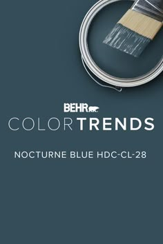 a paint can with a brush on it and the words behr colortrends