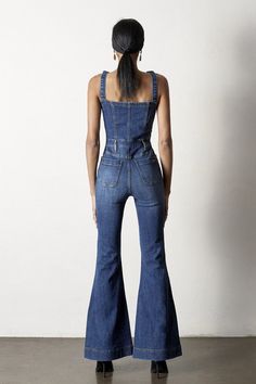 Front Buttons Flare Denim Overalls- 98% Cotton, 2% Spandex- Stretch Denim- Flare Leg- Front Bottons - Imported, Designed In USASize S- Waist 26 1/2"- Hip 32 1/2"- Front Rise 11 3/4"- Leg Opening 24"- Inseam 33"Model wears size S, height 5'9"*For detail size spec, please message us* Style: Causal Print / Pattern: Dark Wash Denim Silhouette: Jumpsuit Flare Fit: Regular Embellishment: Adjustable shoulder strap Neck Line: N/A Sleeve: Sleeveless Length: Long Closure: Front Button Closure Lining: No M Fitted High-waist Denim Blue Jumpsuit, Fitted Full-length Flare Jeans For Summer, Medium Wash Stretch Denim Jumpsuit, Stretch Denim Blue Denim Jumpsuit, Stretch Denim Blue Jumpsuit, Fitted Dark Wash Jeans, Stretch Denim Jumpsuit In Denim Blue, High Waist Stretch Denim Jumpsuit, Stretch High-waisted Denim Jumpsuit