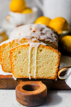 Slices of lemon loaf bread on a serving board.