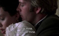 a man and woman kissing each other with the caption you're mine say you're mine