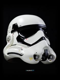 a star wars helmet is shown on a black background