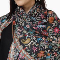 Elevate your style with the Kashmiri Kalamkari Wrap in Black, a unique hand painted scarf crafted from luxurious Merino wool. Experience the beauty of traditional kalamkari art with this must-have accessory. 100% Fine Merino Wool Hand Aari Work Embroidery Outing Kalamkari wraps are hand painted and augmented with intricate hand embroidery on the print of the wrap. One Size: 28 Inch (Width) X 80 Inch (Length) | (71 cm X 203 cm) Ideal & Elegant gift Choice! solve your gifting worries today with so Winter Motifs Shawl, Traditional Black Dupatta With Kalamkari Print, Multicolor Pashmina Scarves With Paisley Print, Traditional Multicolor Silk Shawl Scarf, Traditional Multicolor Scarves For Winter, Black Bohemian Pashmina Shawl For Winter, Traditional Drape Pashmina Silk Scarf, Traditional Multicolor Winter Scarf, Multicolor Silk Scarf With Traditional Patterns