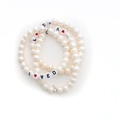 8mm white freshwater potato pearls with L❤️VED letters. a reminder for yourself or someone else that you are and they are LOVED choose size : small fits approximately 6-6.5” wrist, medium fits approximately 6.5-7.25”wrist, large fits 7.25-8” wrist, XL fits approximately 8-8.5 bracelets are made on stretch elastic, please remove when bathing or swimming to keep most clean and in best shape ***LISTING IS FOR ONE BRACELET*** Classic Personalized White Pearl Bracelet, Everyday White Pearl Beaded Bracelets, Classic White Pearl Bracelet For Mother's Day, Classic White Name Bracelet As Gift, Personalized Round Beads Pearl Bracelet For Everyday, Classic White Bracelets For Mother's Day, Classic White Beaded Bracelets With Pearl Charm, Pearl Bracelet With Letter Beads For Gift, Personalized White Pearl Beaded Bracelets