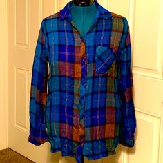 Recently Lost Employment Due To A Severe Medical Condition And I Am Selling My Clothes For Food And Shelter Money. Brand New With Tags Color Is Blue Jewel And It Sparkles Royal Blue Purple Plaid Collared Long Sleeves Button Front One-Pocket Style Tunic Length Rayon Machine Wash Cold Imported Approximate Flat Lay Measurements Armpit-To-Armpit: 21” Length: 28” Front/30” Back Blue Brown Tan Purple Yellow Blue Buttoned Beach Top, Blue Buttoned Tops For Vacation, Blue Button-up Blouse For Vacation, Blue Beach Top With Buttons, Blue Collared Shirt For Loungewear, Blue Button-up Beach Blouse, Blue Buttoned Tops For Loungewear, Blue Relaxed Fit Blouse For Loungewear, Blue Beach Blouse With Buttons