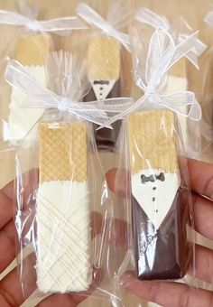 some kind of wedding cookies in plastic wrappers