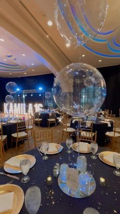 an image of a party setting with balloons and tables set up for a function or event