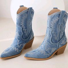 Womens Blueembroidered Western Cowboy Mid-Calf Chunky Heel Pull-Up Tabs Classic Cowgirl Boots Eyelet Embroidery Slip-On Low Heel Upper Material: Fabric Outsole Material: Rubber Blue Western Boots For Summer, Blue Denim Winter Boots, Blue Embroidered Boots For Spring, Blue Embroidered Spring Boots, Light Blue Boots For Fall, Classic Cowgirl, Eyelet Embroidery, Pull Up, Cowgirl Boots