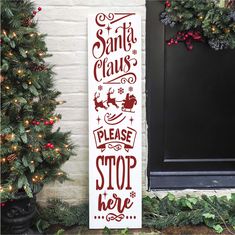 a wooden sign that says dear santa, we have been good on the front porch