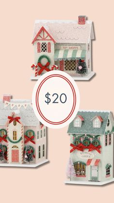 three christmas houses are shown with the price tag for $ 20 and one has a red bow