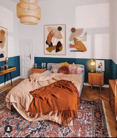 a bed sitting in a bedroom on top of a rug next to a wooden table