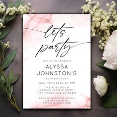 a party card with flowers and greenery