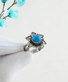 Turquoise Silver Boho Lotus Flower Ring, 925 Sterling Artisan Handmade Filigree Lotus Floral Goth Cocktail Ring, Women Statement Ring Blue gemstone ring, one of a kind ring, best friends gift, birthday gift ring, birthstone ring, december ring Material: 925 Sterling Silver ( NICKEL FREE ) Gemstone: Turquoise 8 mm. -The stone used in this jewelry, Turquoise, is the December Birthstone. Any jewelry that carries a Turquoise signifies so much passion and love between two people, that it makes Turquoise an ideal choice for engagement or Valentine's Day jewelry. FREE, FAST AND TRACKABLE SHIPPING FOR ALL EU COUNTRIES AND USA. Turquoise has been used for thousands of years for jewelry by the Ancient Egyptians, who buried fine pieces with mummies. Aztecs fashioned elaborate turquoise masks. Today, Handmade Bohemian Sterling Silver Flower Ring, Bohemian Gemstone Flower Ring As Gift, Bohemian Sterling Silver Flower Ring Gift, Turquoise Flower Ring Gift, Bohemian Flower Ring For Jewelry Making, Bohemian Flower Ring With Gemstone, Adjustable Turquoise Flower Ring Gift, Unique Turquoise Flower Jewelry, Bohemian Sterling Silver Flower Ring