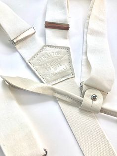 Vintage White Wedding Tuxedo Suspenders with Silver Classic Adjustable Belts And Suspenders For Everyday, Classic Adjustable Belt With Leather Strap, Vintage Adjustable Belts And Suspenders For Everyday Use, Classic Adjustable Belts And Suspenders For Summer, Adjustable Belts And Suspenders For Summer, Vintage Belts And Suspenders With Adjustable Straps, Tuxedo White, White Suspenders, Plain White T's