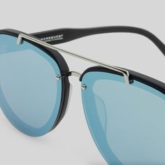 This designer style gives the illusion of a frameless aviator with the security of a hidden acetate frame. #SS19 #newlaunch #oversized (In the picture) #DRACO Collection (CARBON BLACK X BLUE)⠀⁠ Modern Blue Sunglasses With Uv Protection, Modern Blue Anti-reflective Sunglasses, Modern Blue Sunglasses With Mirrored Lenses, Rimless Shield Sunglasses With Mirrored Lenses, Modern Outdoor Sunglasses With Gradient Lenses, Modern Sunglasses With Gradient Lenses For Outdoor, Modern Rimless Polycarbonate Shield Sunglasses, Modern Blue Polycarbonate Sunglasses, Modern Blue Plastic Sunglasses