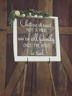 a sign that says choose a seat not a side, we're all family once the knot is tied