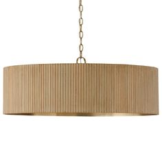 a light fixture hanging from a chain on a white wall with a beige drum shade