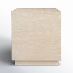 an unfinished wooden block on a white background