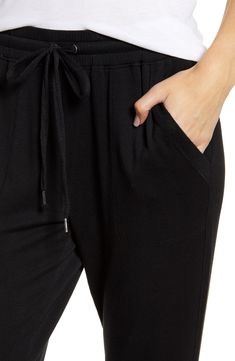 Supersoft and stretchy, these joggers have a slim yet relaxed fit that feels right at home in your casual wardrobe. 27 1/2" inseam Elastic/drawstring waist Front slant pockets 95% modal, 5% spandex Machine wash, tumble dry Made in the USA t.b.d. Black Athleisure Joggers For Lounging, Stretch Straight Leg Joggers For Leisure, Leisure Straight Leg Stretch Joggers, Black Relaxed Fit Joggers For Lounging, Black Joggers With Ribbed Waistband For Lounging, Casual Black Activewear For Lounging, Black Joggers With Pockets For Lounging, Relaxed Black Loungewear Pants, Stretch Joggers For Loungewear