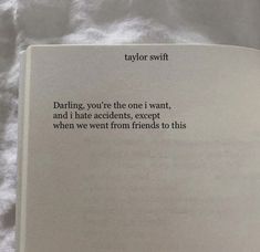 an open book with the words taylor swift written in black on it's cover