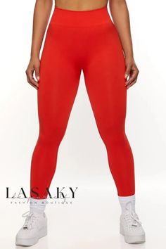 Lasaky - High-Quality Athletic Set: Womens Seamless Yoga Leggings with Butt Lift, Sports Bra, and Halter Top Gym Seamless Tights, High Stretch Red Athleisure Leggings, Orange Seamless Activewear For Gym, Orange Seamless Gym Activewear, Seamless Training Pants, Solid Seamless Yoga Leggings, Casual Seamless Gym Leggings, Orange Seamless Stretch Activewear, Red Compression Yoga Leggings