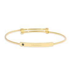 This elegant gold bangle bracelet features an engravable bar and a birthstone, adding a luxurious and meaningful touch to your look. Made from high-quality materials, this bracelet is sure to become a treasured piece of jewelry. Coordinates Jewelry, Monogram Jewelry, Engraved Bracelet, Cz Stud Earrings, Gold Bangle Bracelet, Gold Bangle, Engraved Jewelry, Custom Bracelets, Gold Bangles