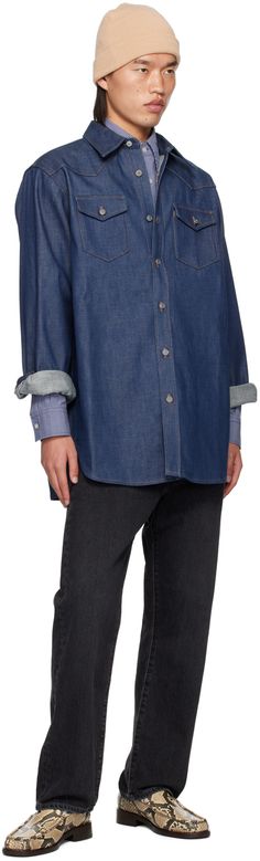 Oversized non-stretch organic cotton denim shirt. · Spread collar · Button closure · Flap pockets · Shirttail hem · Pleats at two-button barrel cuffs · Logo-engraved silver-tone hardware · Contrast stitching in tan Supplier color: Indigo blue Denim Blue Shirt With Spread Collar For Work, Denim Blue Spread Collar Shirt For Work, Oversized Cotton Denim Top For Workwear, Classic Medium Wash Shirt With Button Cuffs, Washed Blue Relaxed Fit Tops With Button Cuffs, Medium Wash Button-up Shirt With Button Cuffs, Blue Denim Button-up Top With Button Cuffs, Blue Button-up Denim Top With Button Cuffs, Classic Denim Shirt With Button Cuffs