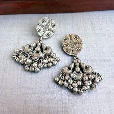 German Silver daily wear jhumka Earrings, indian jewelery,indian jewelry,indian jhumkas,desi jewelry,pakistani jewelry Best use for gifting purposes. It can be wore on any occasion and with any outfit. OCCASION: PARTY WEAR, WEDDING, MARRIAGES, CASUAL, DAILY WEAR These Earrings set have an excellent finish Ideal Gift Idea: Perfect beautiful & memorable gift for you and your loving wife, girlfriend, sister, aunt, daughter, and mom/mother/mummy. CARE Avoid Contact With Chemicals Such As Perfumes Or Traditional Oxidized Drop Earrings Jhumkas, Traditional Oxidized Jhumkas Drop Earrings, Bollywood Oxidized Earrings For Navratri, Traditional Oxidized Finish Jhumkas Drop Earrings, Bollywood Style Oxidized Earrings For Navratri, Oxidized Finish Drop Jhumkas For Festivals, Diwali Oxidized Drop Jhumkas, Diwali Oxidized Finish Drop Jhumkas, Oxidized Finish Dangle Jhumkas For Navratri