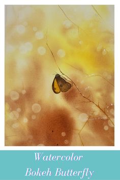 a yellow and black butterfly sitting on top of a leaf covered field with the words watercolor bokeh butterfly