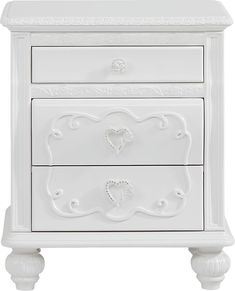 a white nightstand with two drawers