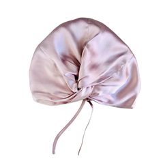 Made from 100% Pure Mulberry grade A Silk, these elegant front twisted silk hair bonnets are not only aesthetically pleasing but also a great hair care product that helps maintain and revive your hair keeping it soft and hydrated. This is our adjustable version with silk adjustable straps that can be adjusted to fit different head sizes.   These caps have been designed to provide a number of hair benefits, few of which include but not limited to :Protects your hair styles and up dos , prevents breakages and split ends by reducing friction ,helps in growing long hair, retains moisture in hair. The material used is 100% double layered silk. In order to maintain the quality of the fabric we advise that you only hand wash this product in cold water and air dry, running a warm steam will remove Growing Long Hair, Silk Hair Bonnets, Hair Bonnets, Stocking Fillers For Her, Grow Long Hair, Up Dos, Hair Bonnet, Pearl Pink, Turban Style