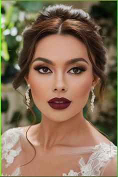 a woman with dark lipstick and makeup looks like she is in the middle of an image