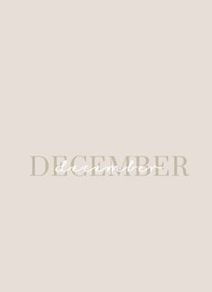 the word december written in white on a beige background