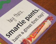 there is a sign on the table that says smartie pants have a great first day